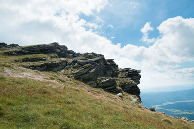Scenic view of rocky mountains against sky