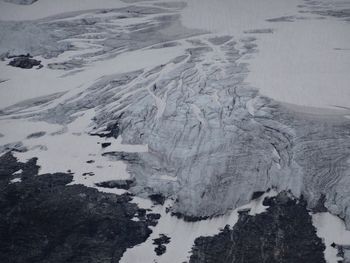 Aerial view of snow covered land