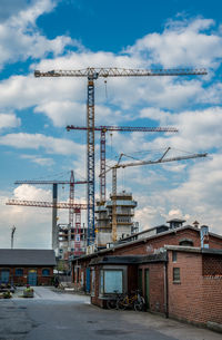 The old southern harbor in aarhus an construction cranes