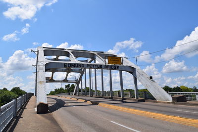 View of bridge against cloudy sky