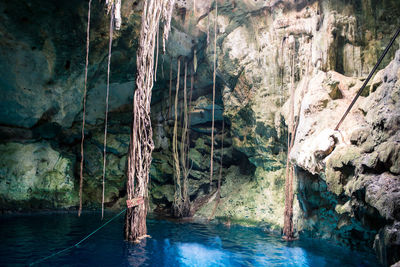 Scenic view of sea and cave