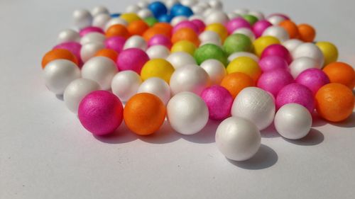 High angle view of multi colored candies on table