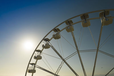 Aerial shot with a drone of a detail of a ferris wheel