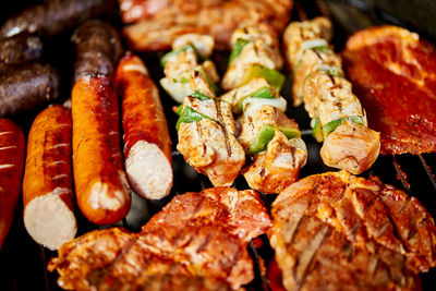 High angle view of meat on barbecue