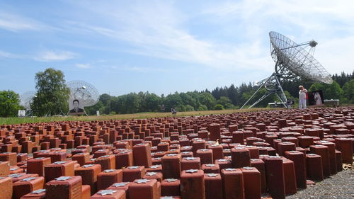 Built structure on field against sky