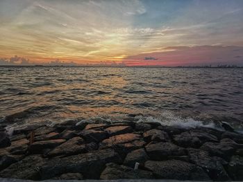 Scenic view of sea against sky during sunset