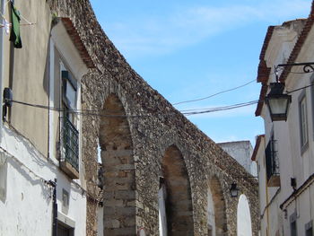 Low angle view of old building against sky