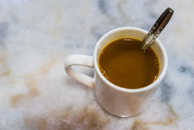 Close-up of tea cup on table