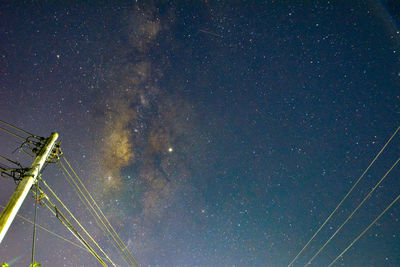 Low angle view of stars against sky at night