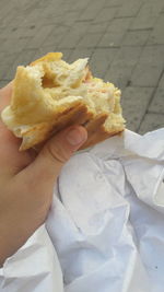 Close-up of hand holding ice cream