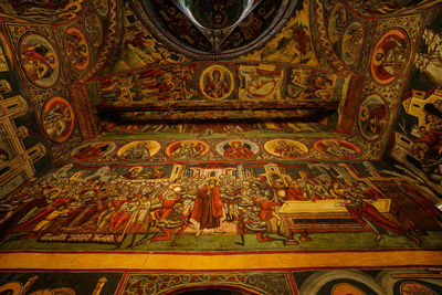 Low angle view of cross on ceiling in temple