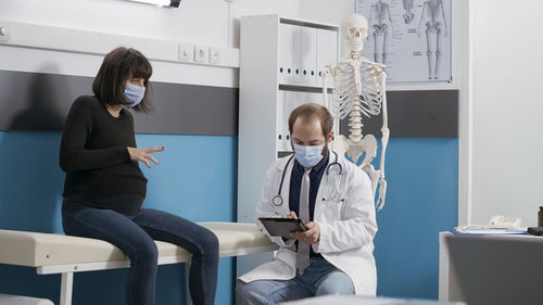 Young female doctor working in clinic