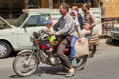 People on street in city