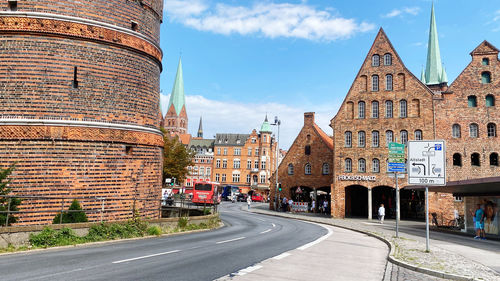 Buildings in city against sky