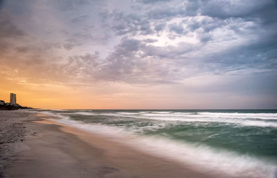 Scenic view of sea against sky during sunset