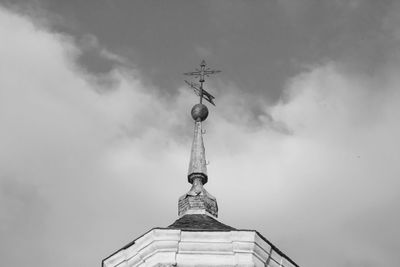 Low angle view of bell tower against sky