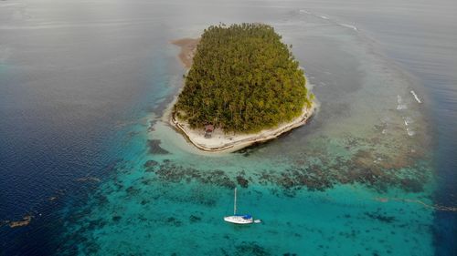 High angle view of island amidst sea