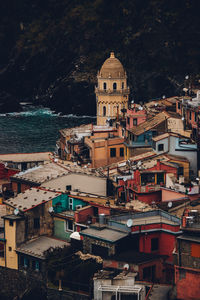 High angle view of townscape against sea