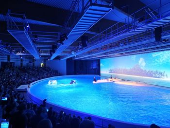 People enjoying at swimming pool