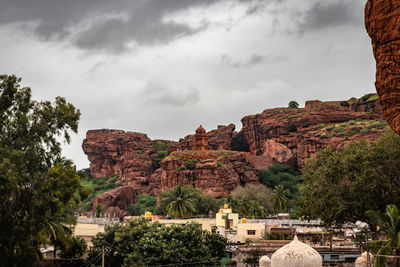 Badami cave sculptures of hindu gods carved on roof ancient stone art in details