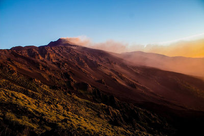 Etna in the suggestive panorama at dawn in the valle del bove - sicily
