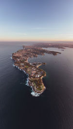 High angle view of sea against sky during sunset