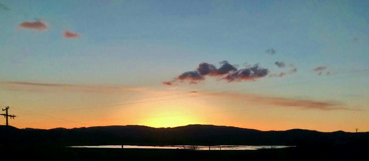 SILHOUETTE LANDSCAPE AGAINST SKY DURING SUNSET