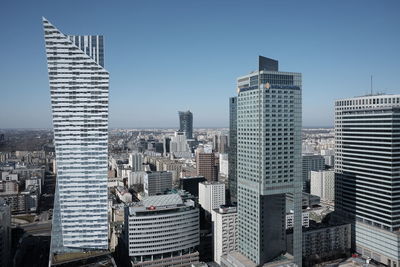 Modern buildings against sky in city