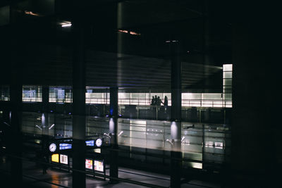 Illuminated railroad station at night