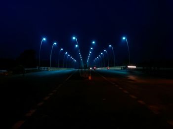 Illuminated road at night