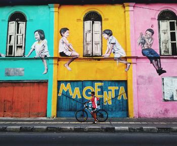 Bicycle against graffiti wall