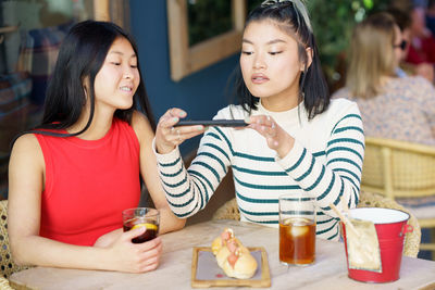 Young woman using mobile phone