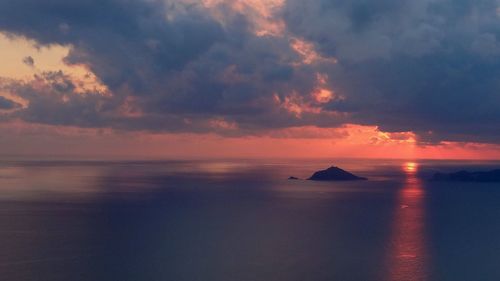 Scenic view of sea against sky at sunset