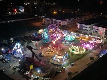 High angle view of illuminated city at night