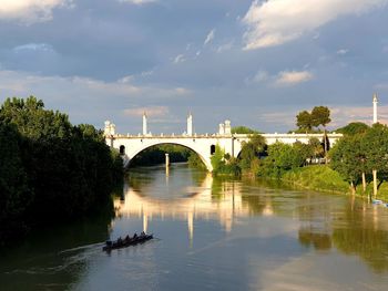 Bridge over river against sky