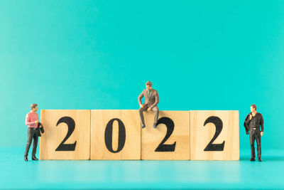 Group of people against blue background