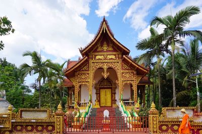 Temple against cloudy sky