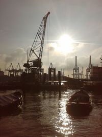 Silhouette of cranes at sunset