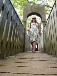 Full length of woman on wall