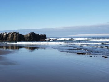 Scenic view of sea against clear sky