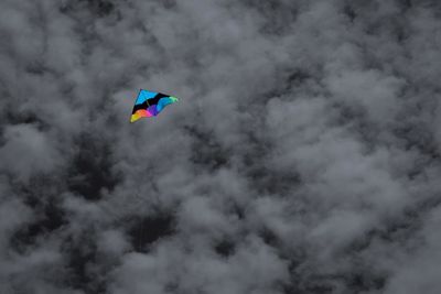 Low angle view of kite flying in sky