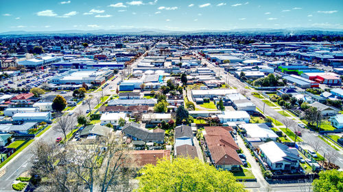 High angle view of street amidst buildings in city