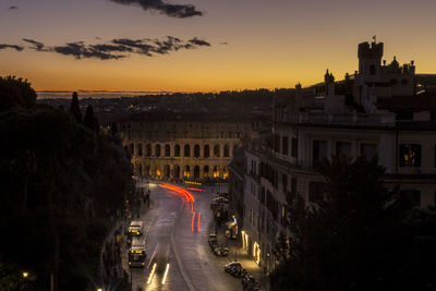 High angle view of city at sunset