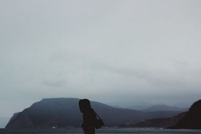 Woman looking at mountains