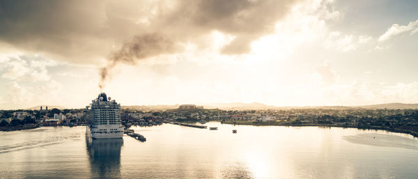 Panoramic view of river against cloudy sky