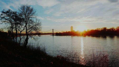 Scenic view of sunset over city