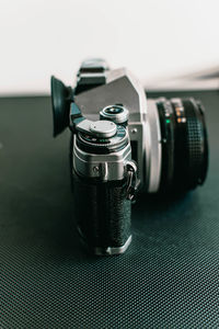 Close-up of camera on table