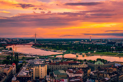 High angle view of city at sunset