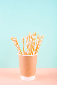 Close-up of drink against blue background