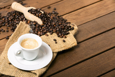 High angle view of coffee cup on table